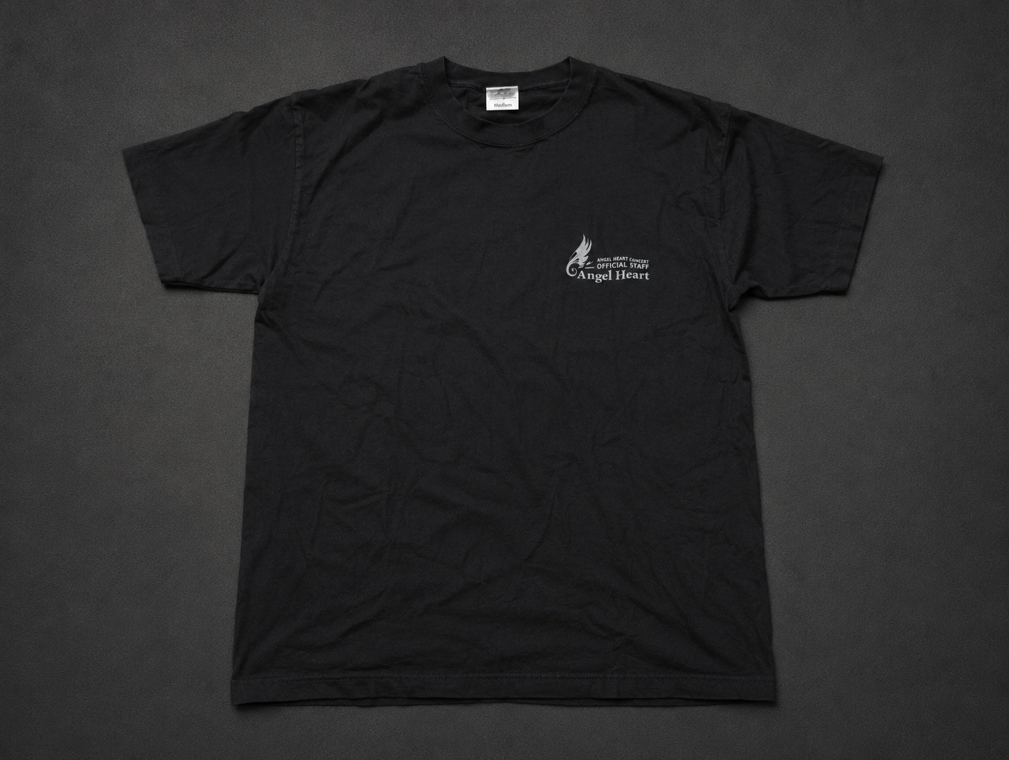 Black Small Chest Logo Tee from Quality Thrift, one-of-one pre-loved apparel listing