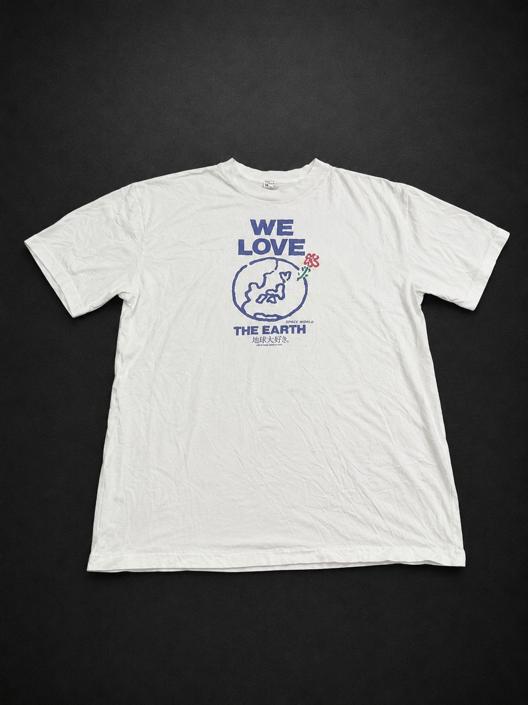 White We Love The Earth Graphic Tee from Quality Thrift, one-of-one pre-loved apparel listing