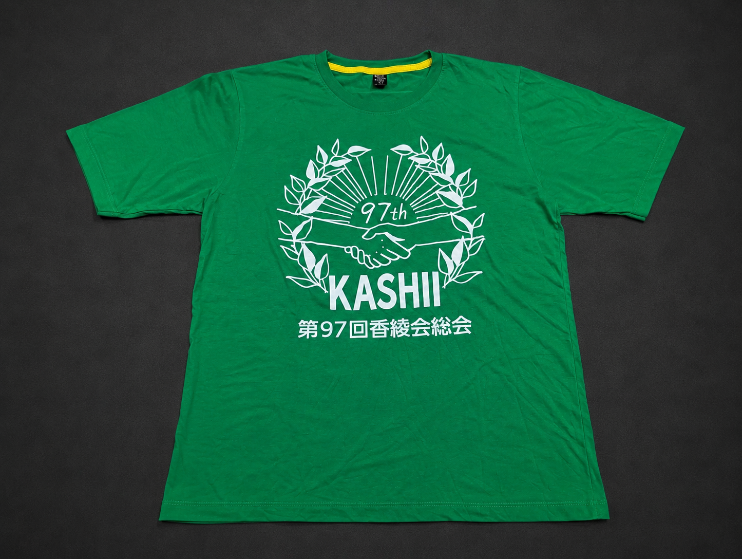 Green Kashii Crest Graphic Tee from Quality Thrift, one-of-one pre-loved apparel listing