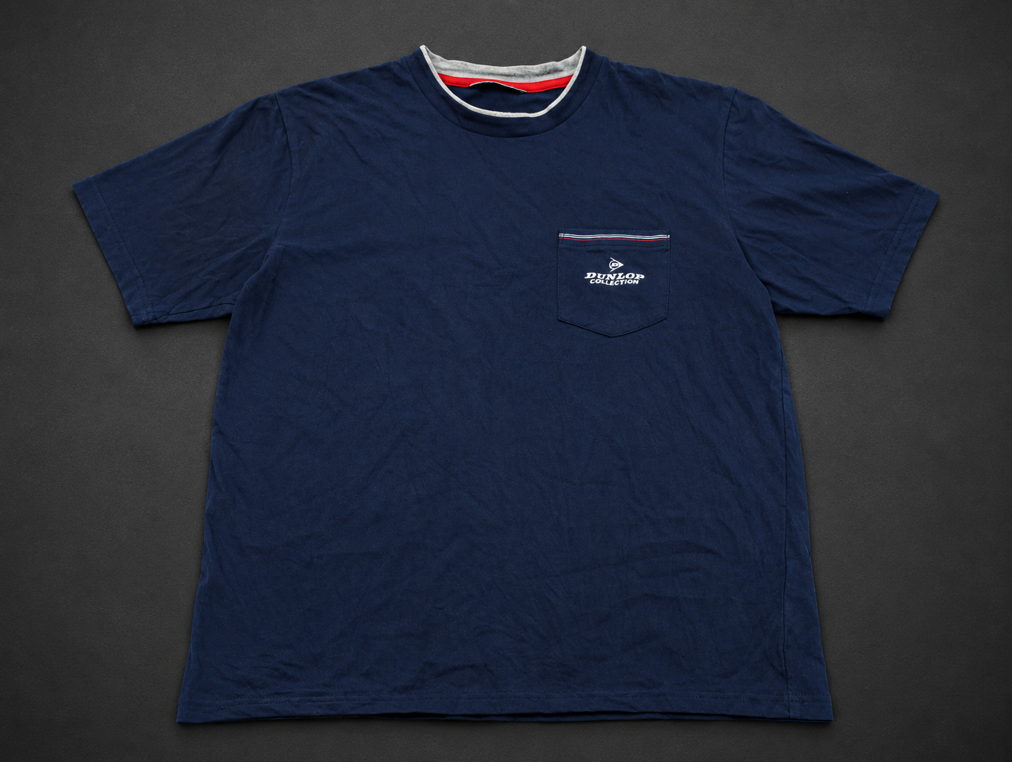 Navy Small Chest Logo Tee from Quality Thrift, one-of-one pre-loved apparel listing