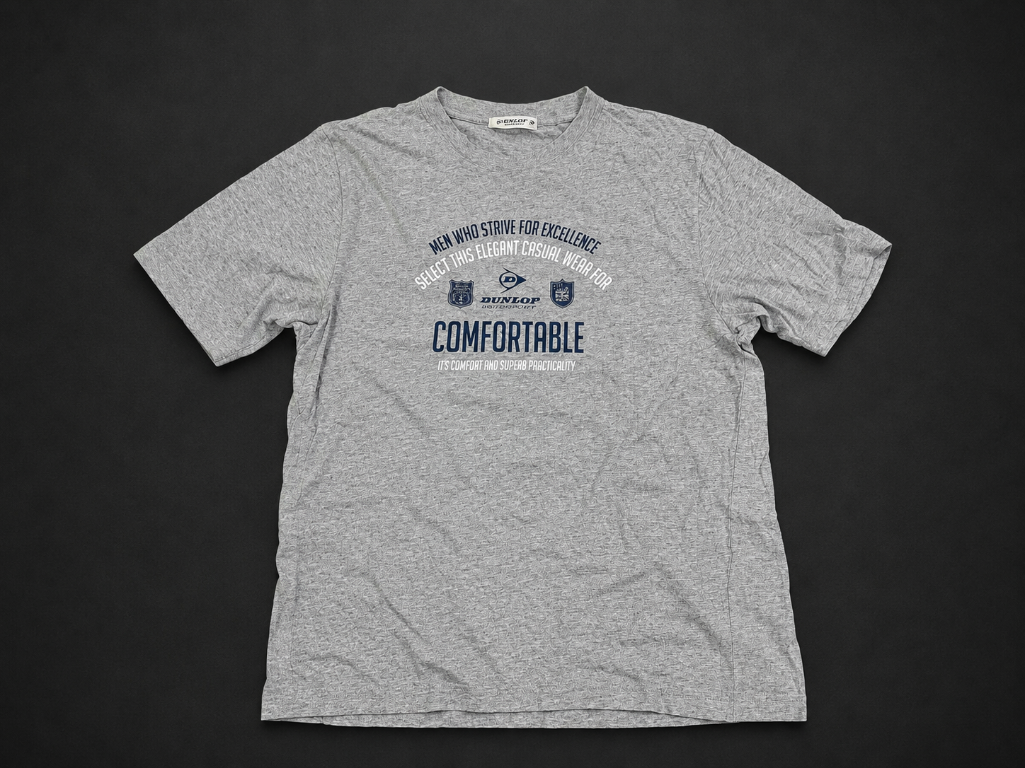 Grey Comfortable Collegiate Graphic Tee from Quality Thrift, one-of-one pre-loved apparel listing