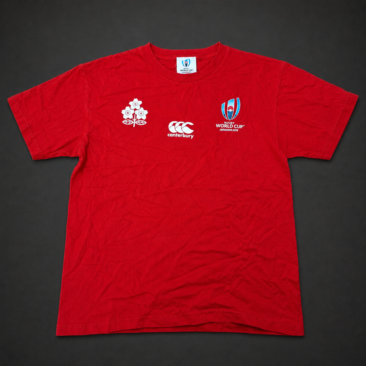Red Rugby Event Front Graphic Tee, one-of-one pre-loved apparel from Quality Thrift